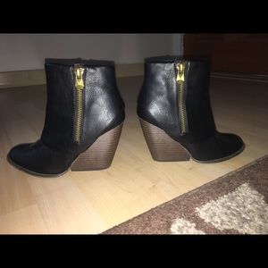 Black wedge booties